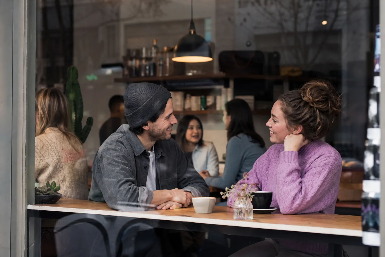 Two London shift workers meeting for coffee between work commitments