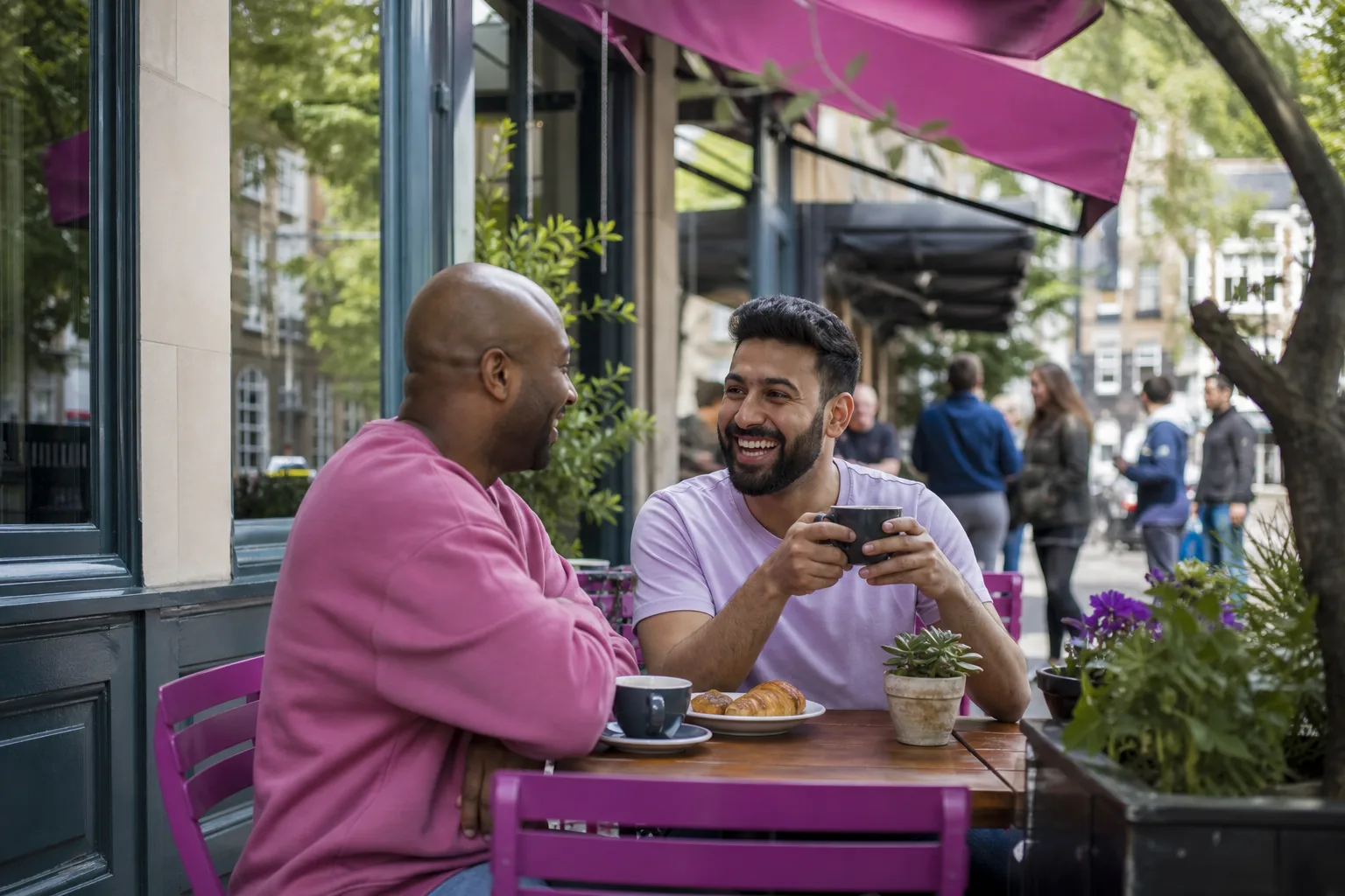 Two men talking over coffee in central Croydon