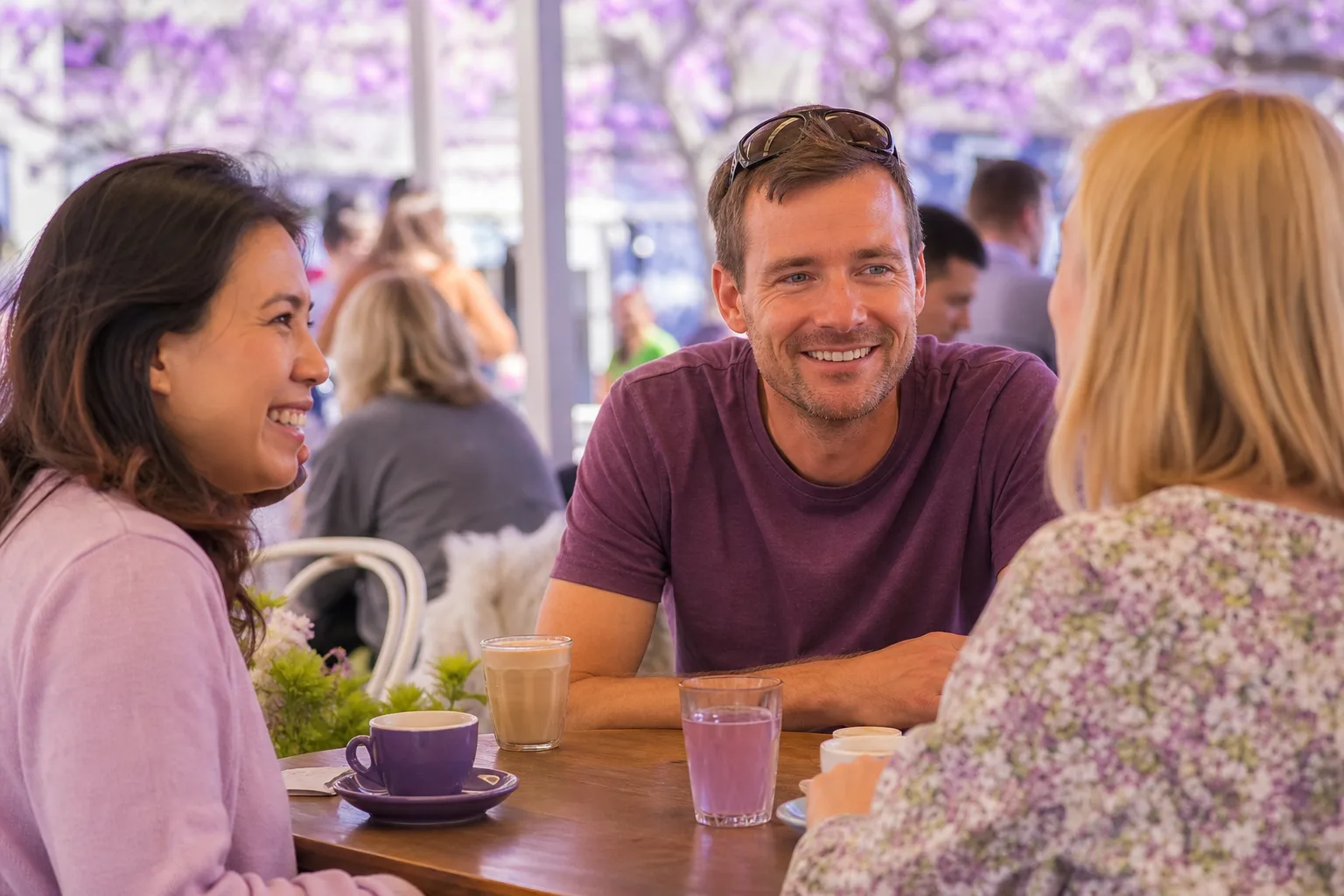 Two single Londoners chatting over coffee at a local café